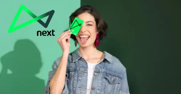 Cartão Next Visa Internacional com logo da empresa.